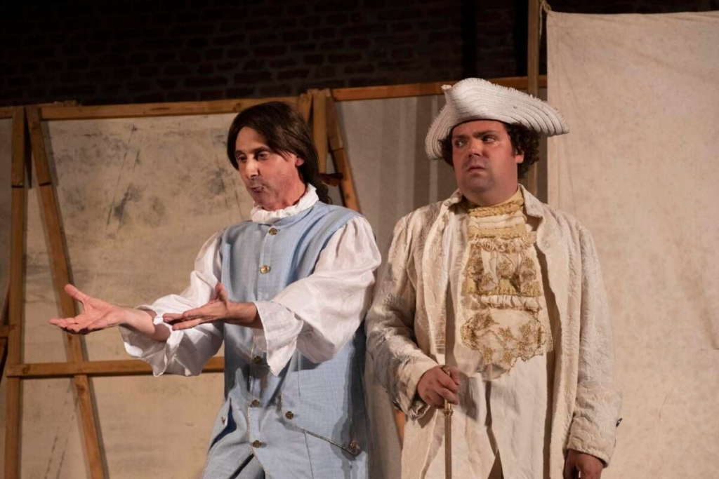 Attori in scena durante lo spettacolo “Il teatro comico” di Carlo Goldoni